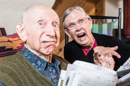 elderly-couple-shocked-at-newspaper