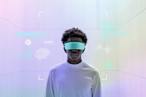 Man wearing smart glasses showing holographic screen futuristic technology